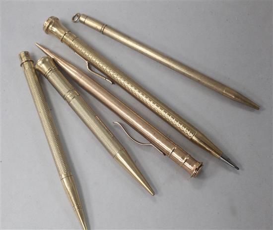 Five 9ct gold overlaid pencils including four engine turned and one by Sampson Mordan & Co.